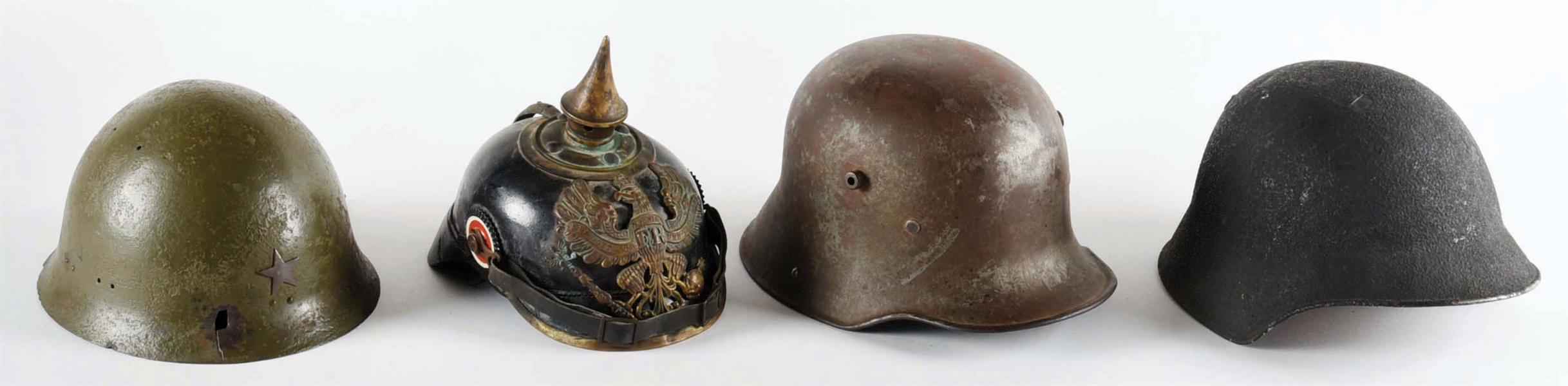 Lot Detail LOT OF FOUR WORLD WAR I AND WORLD WAR II HELMETS