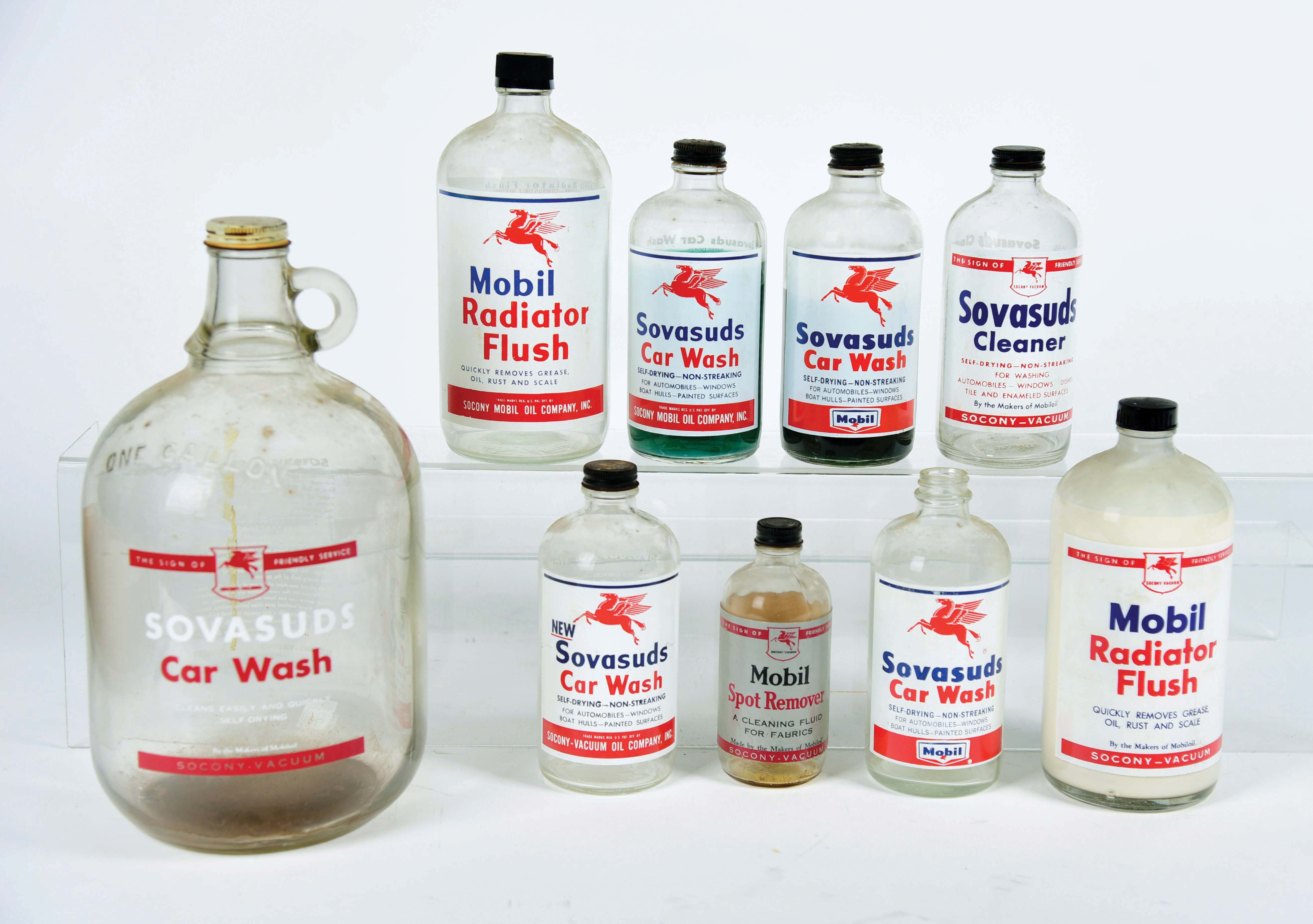 Lot Detail LOT OF 9 MOBIL CAR WASH & RADIATOR FLUSH GLASS JARS.