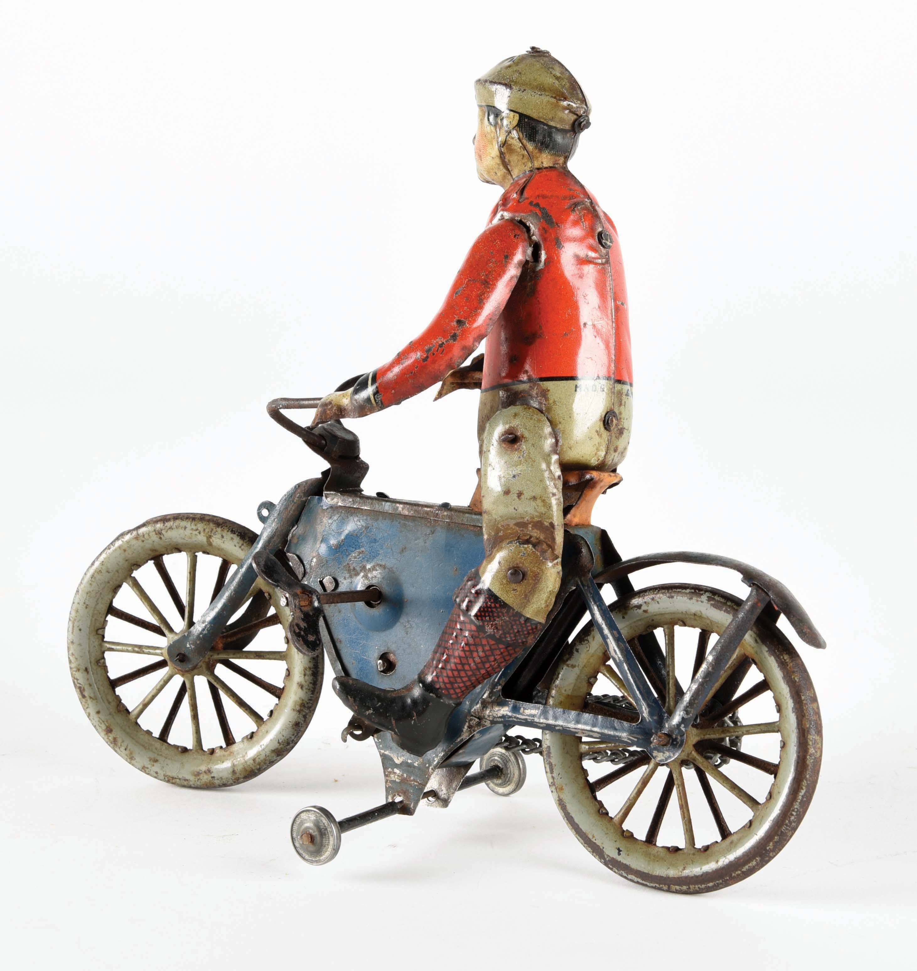 Lot Detail EARLY GERMAN GUNTHERMAN TIN LITHO WINDUP MOTORCYCLE TOY.