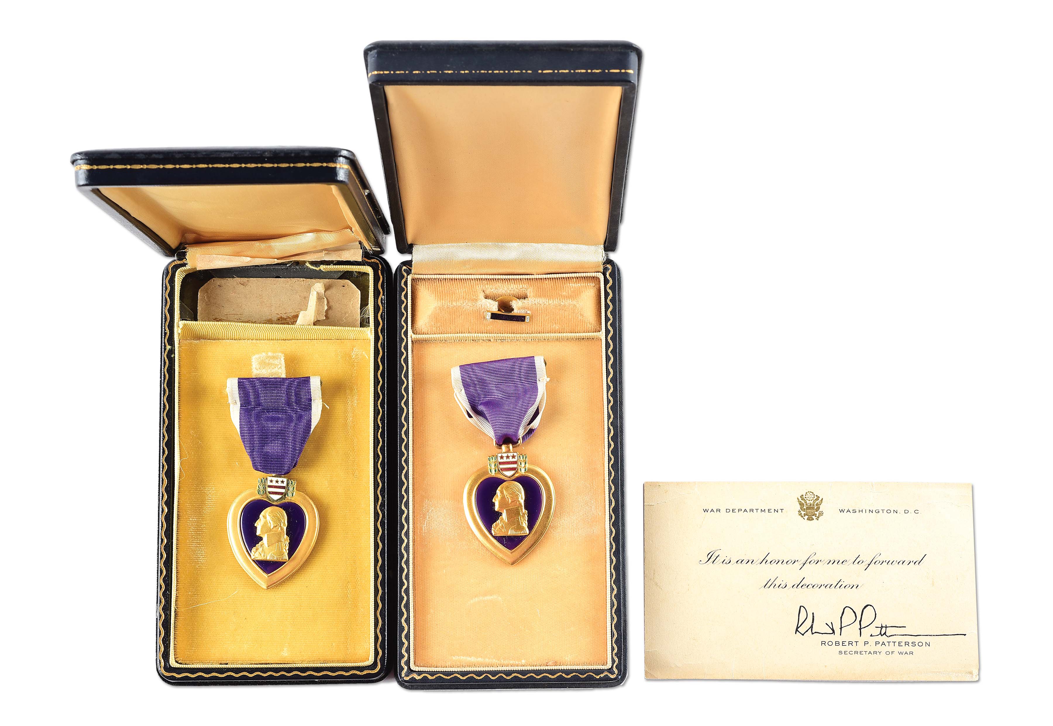 LOT OF 2 US WORLD WAR II ENGRAVED PURPLE HEART MEDALS. auctions