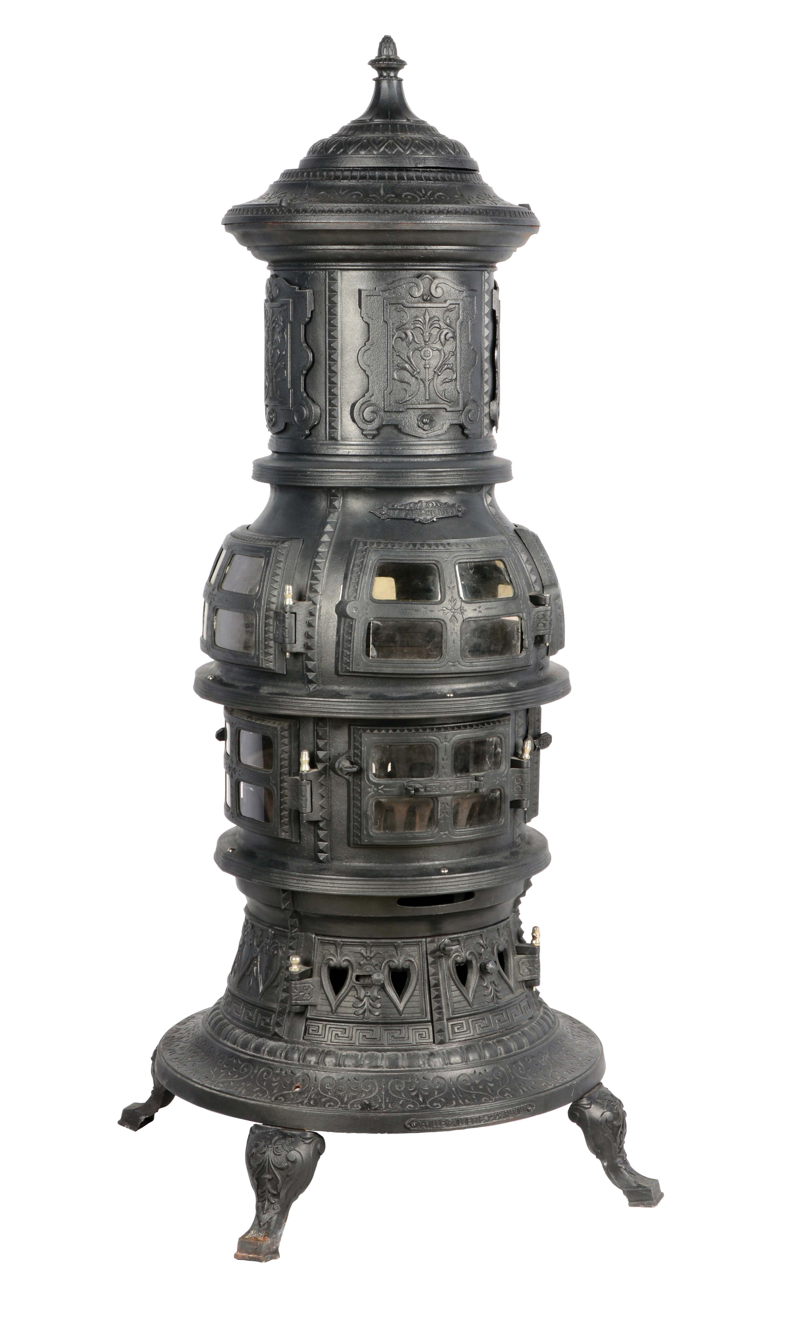 Lot Detail CAST IRON WOOD STOVE WITH CAST IRON HEARTH.