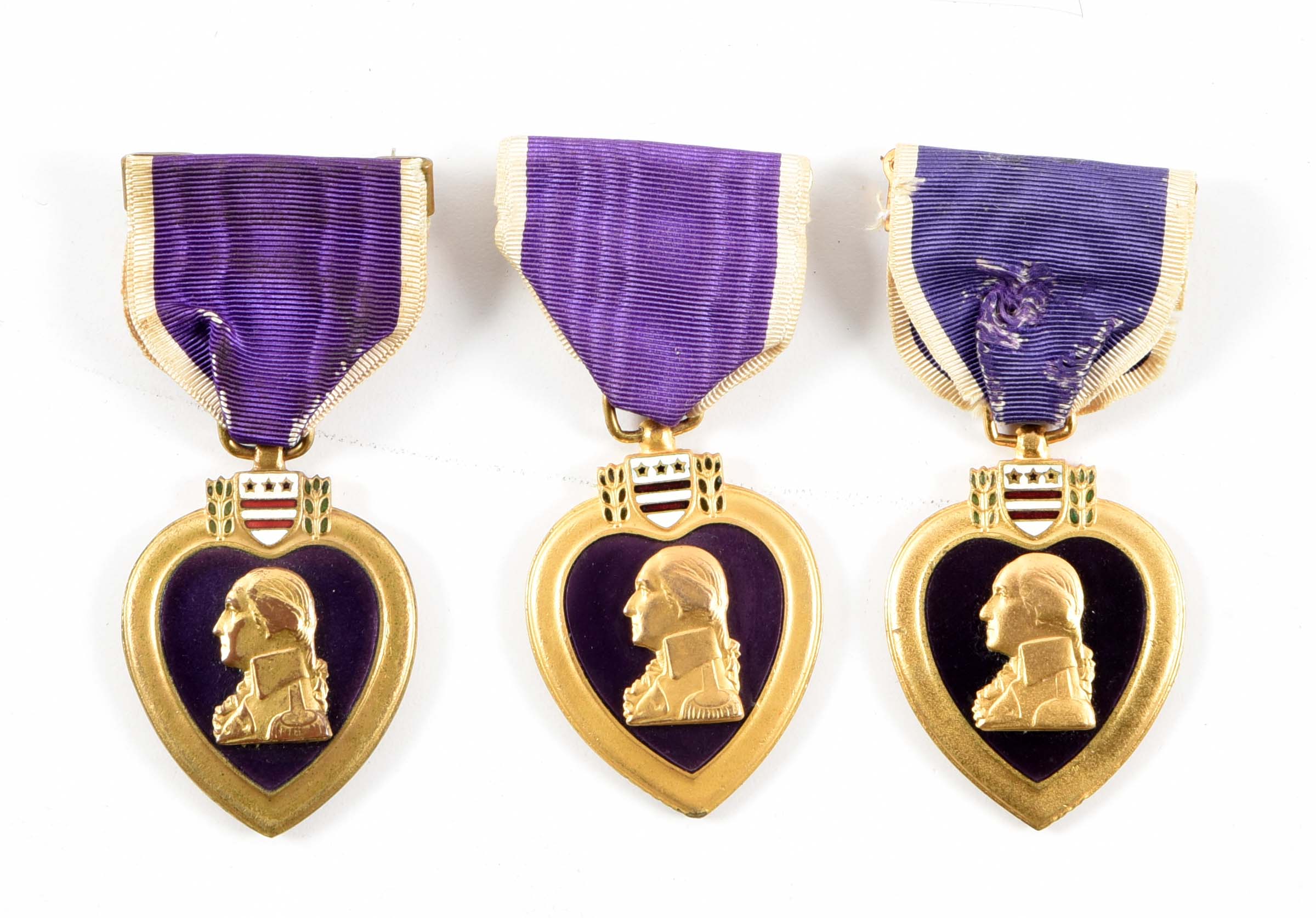 Lot Detail LOT OF 3 US WWIWWII PURPLE HEART MEDALS.