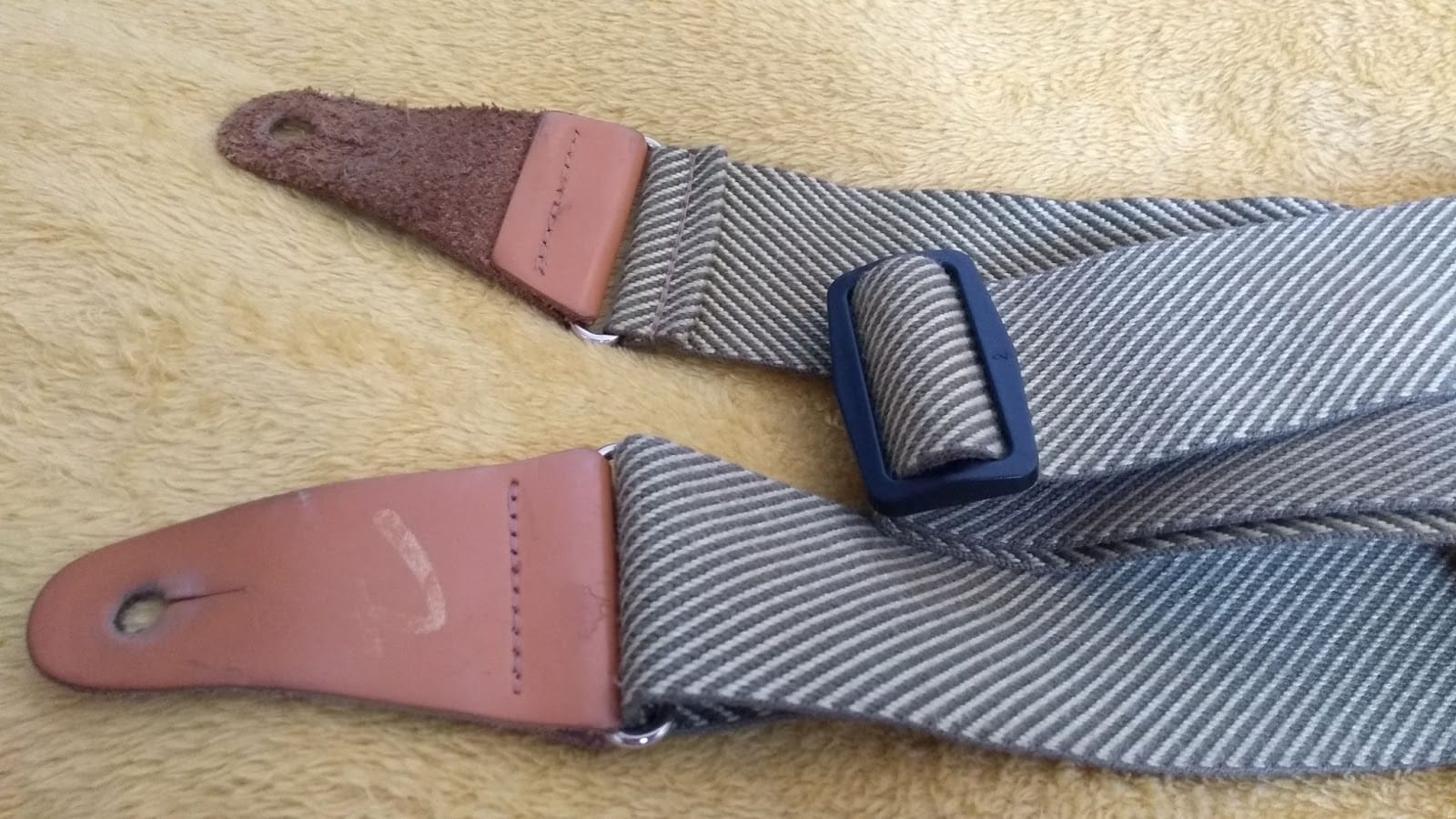 How to Attach a Guitar Strap to an Acoustic Guitar