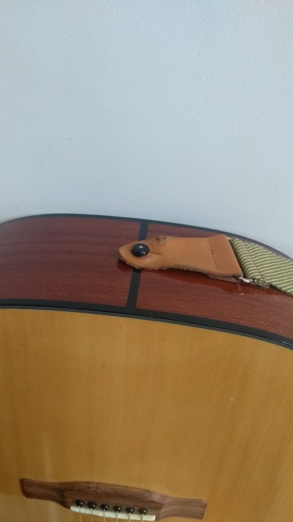 How to Attach a Guitar Strap to an Acoustic Guitar