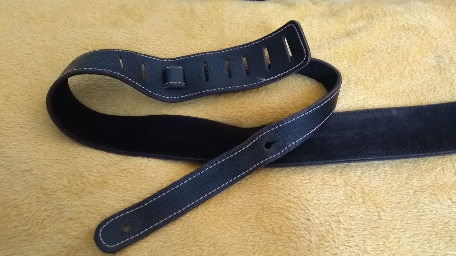 How to Attach a Guitar Strap to an Acoustic Guitar