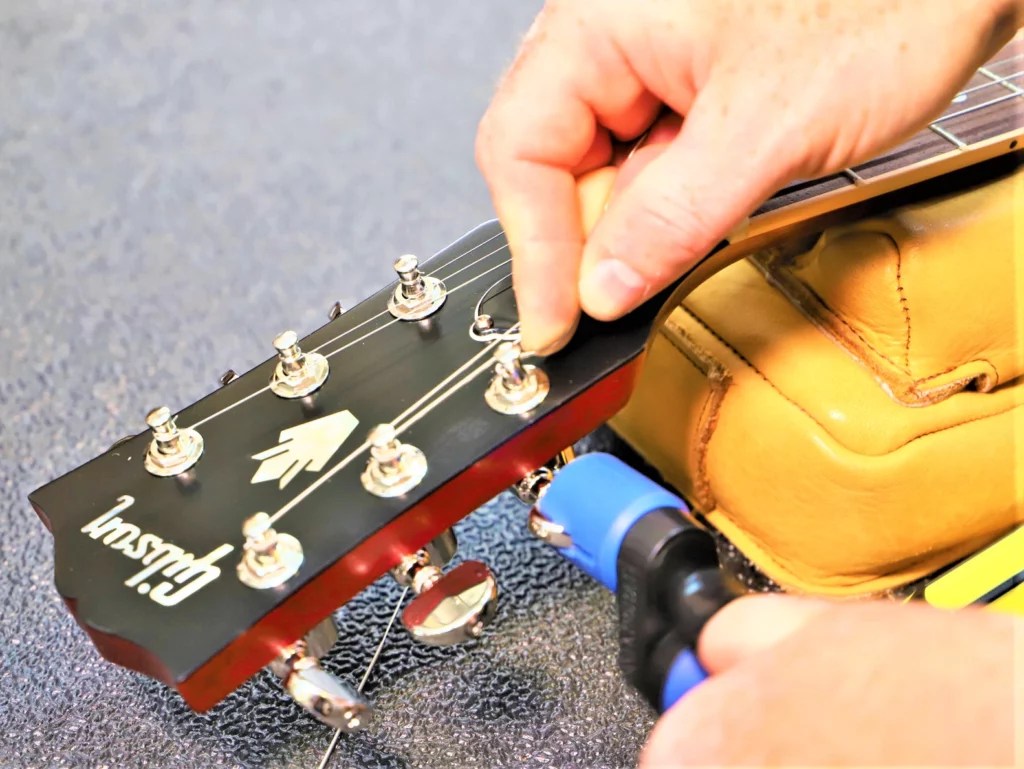 8 Easy Steps How to Restring or Replace an Acoustic Guitar?