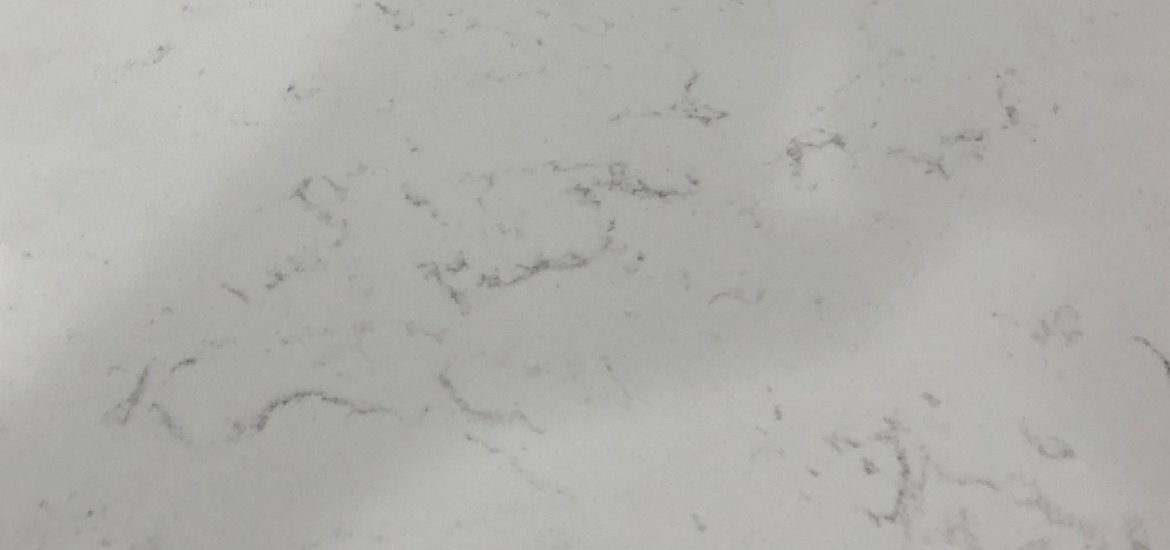 OUR COLLECTION QUARTZ CARRARA WHITE DETAIL — Austin Granite Direct