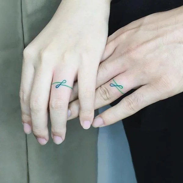 10 Touching and Sexy Wedding Ring Tattoos Available Ideas