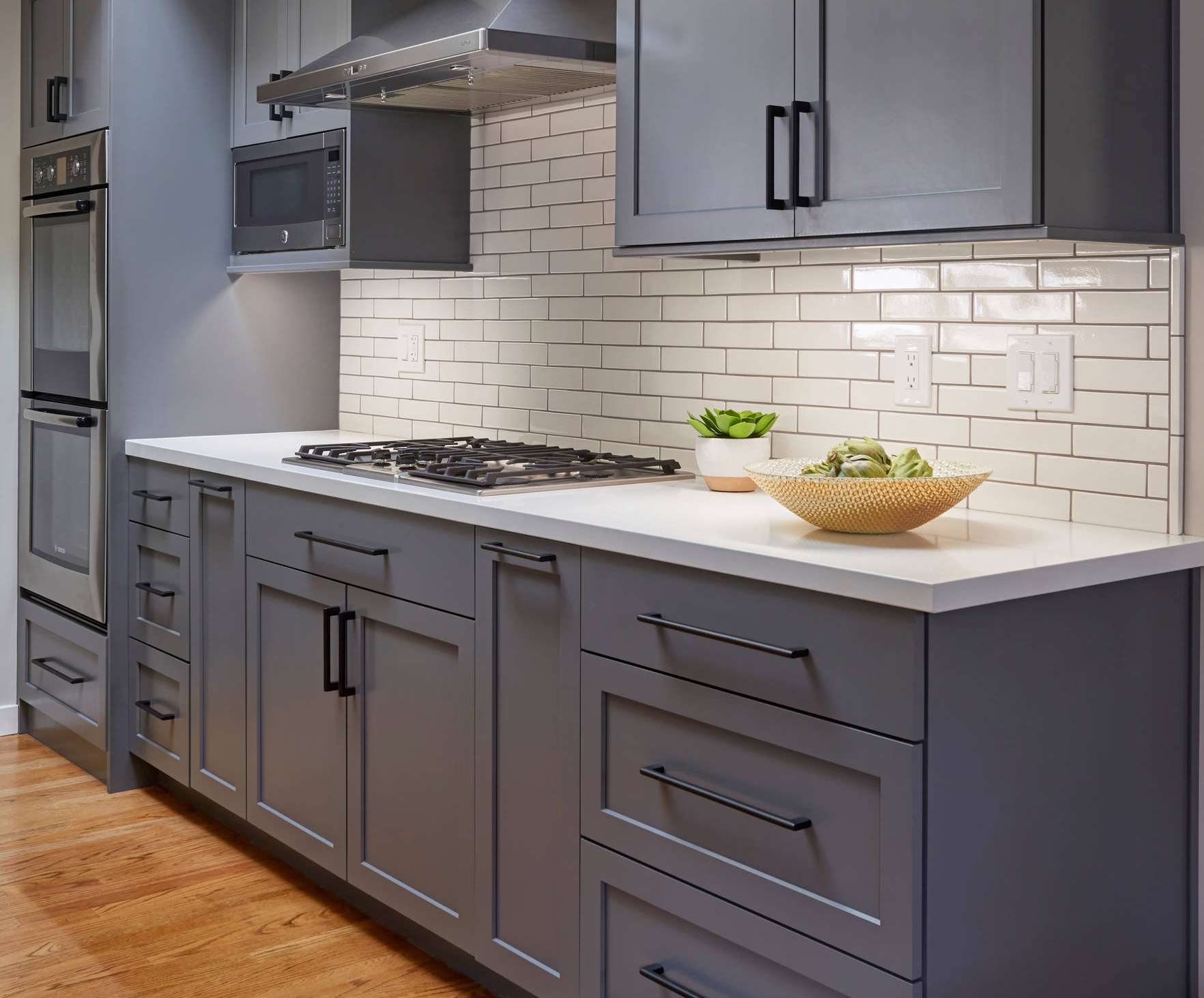 Sleek Grey Kitchen with Subway Tile Backsplash