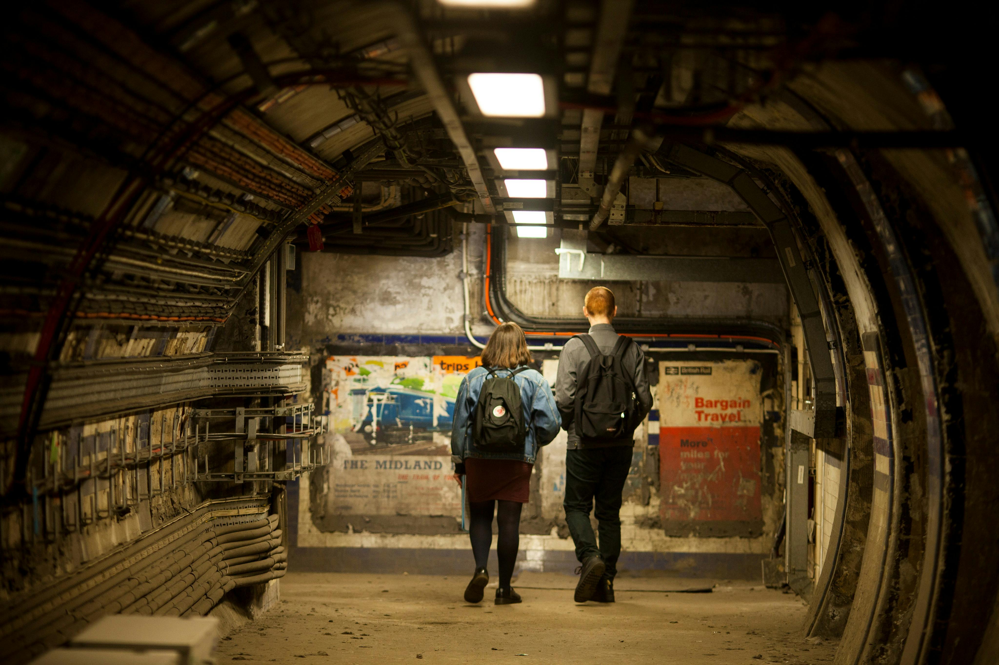 Poster fragments in the unused passages at Euston Underground station