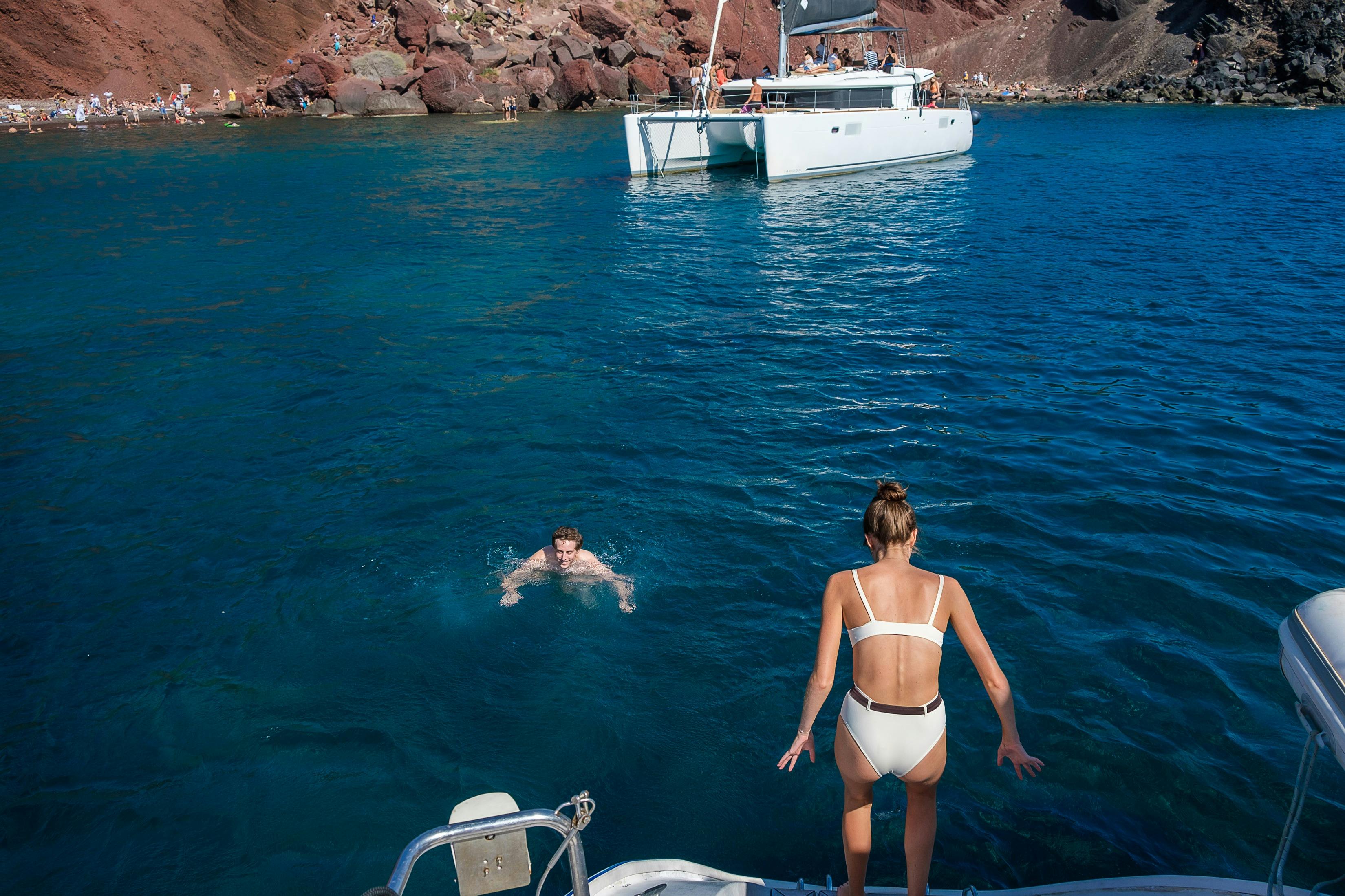 Santorini: Private Catamaran Cruise + Roundtrip Transport