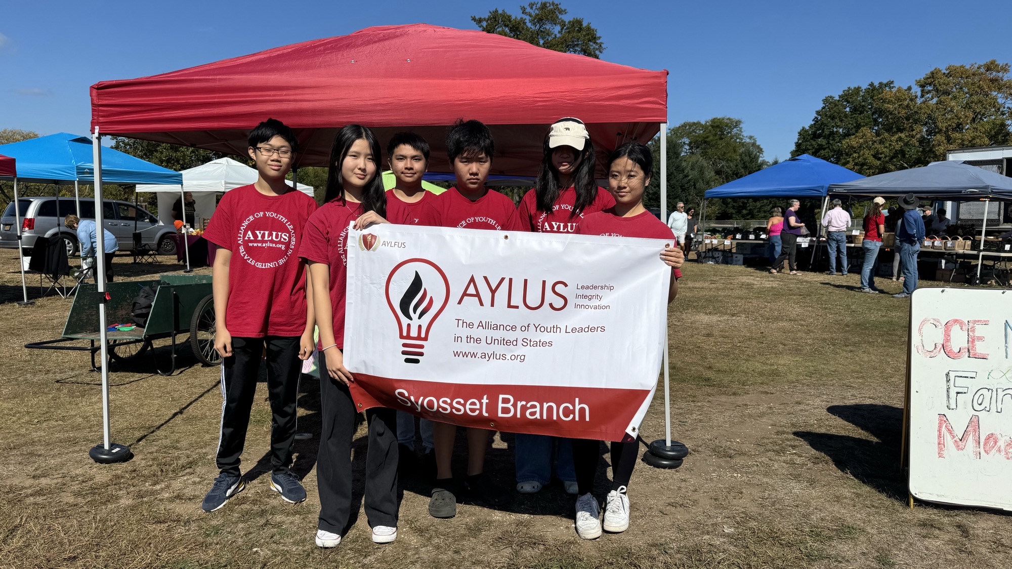 AYLUS Syosset Members Volunteer At Farmer’s Market Alliance of Youth