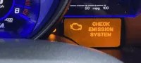 Check Emission System: What It Means, Causes, & Fixes
