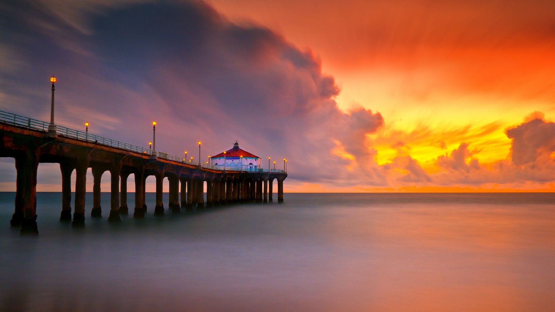 Orange sunset and the Manhattan Beach Pier view wallpaper backiee