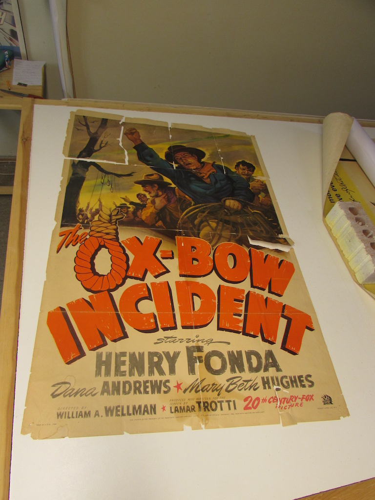 Backing to the Future Movie poster restoration, linen backing, paper