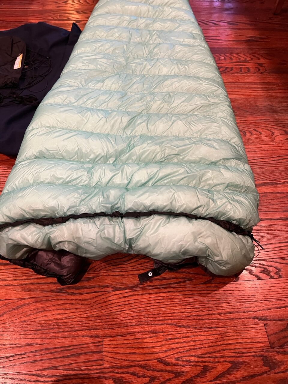 Western Mountaineering Astralite quilt 6'4" 26 degrees 18.7oz. As new