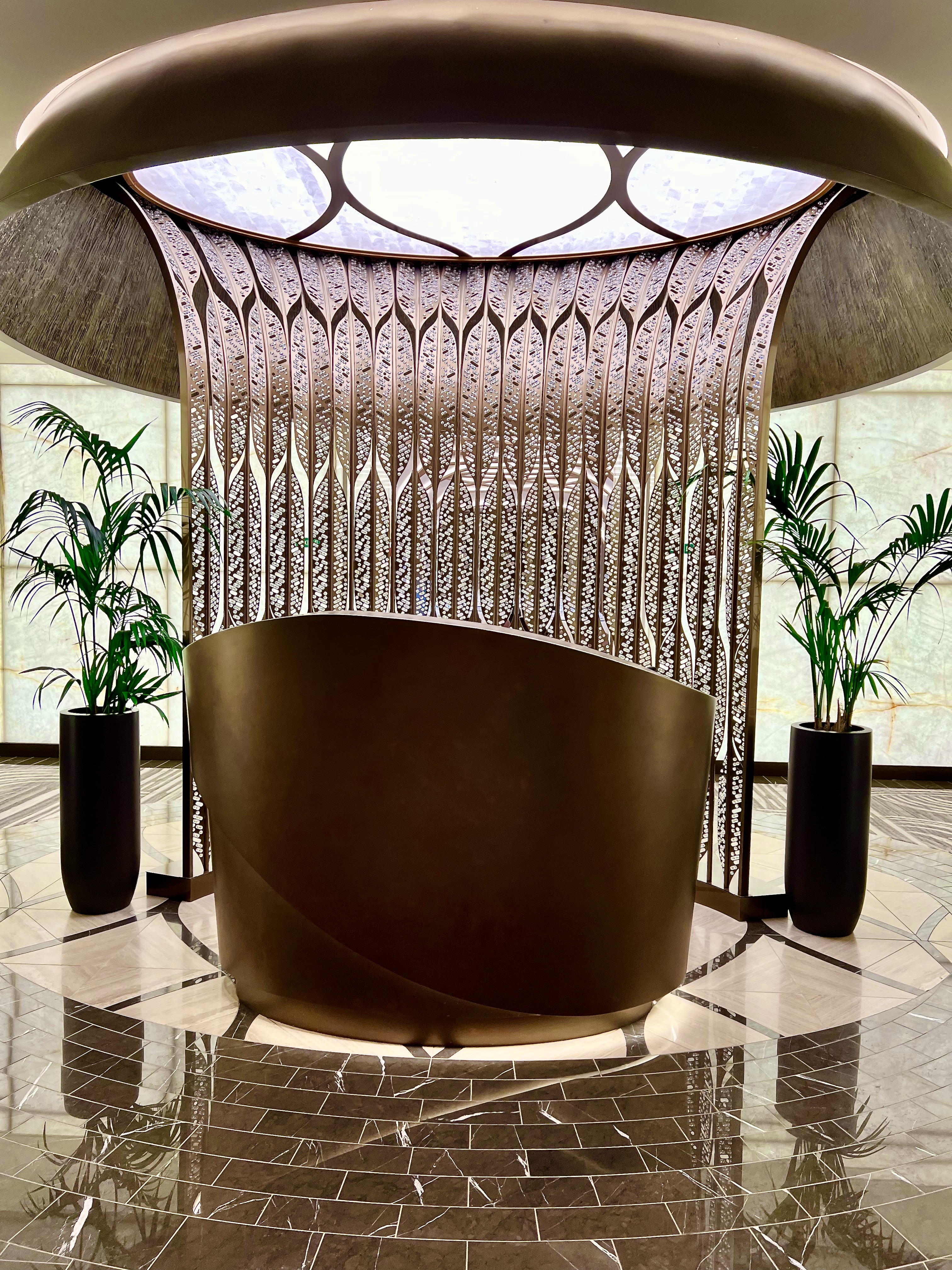 waterfall sculpture at the entrance to compass rose