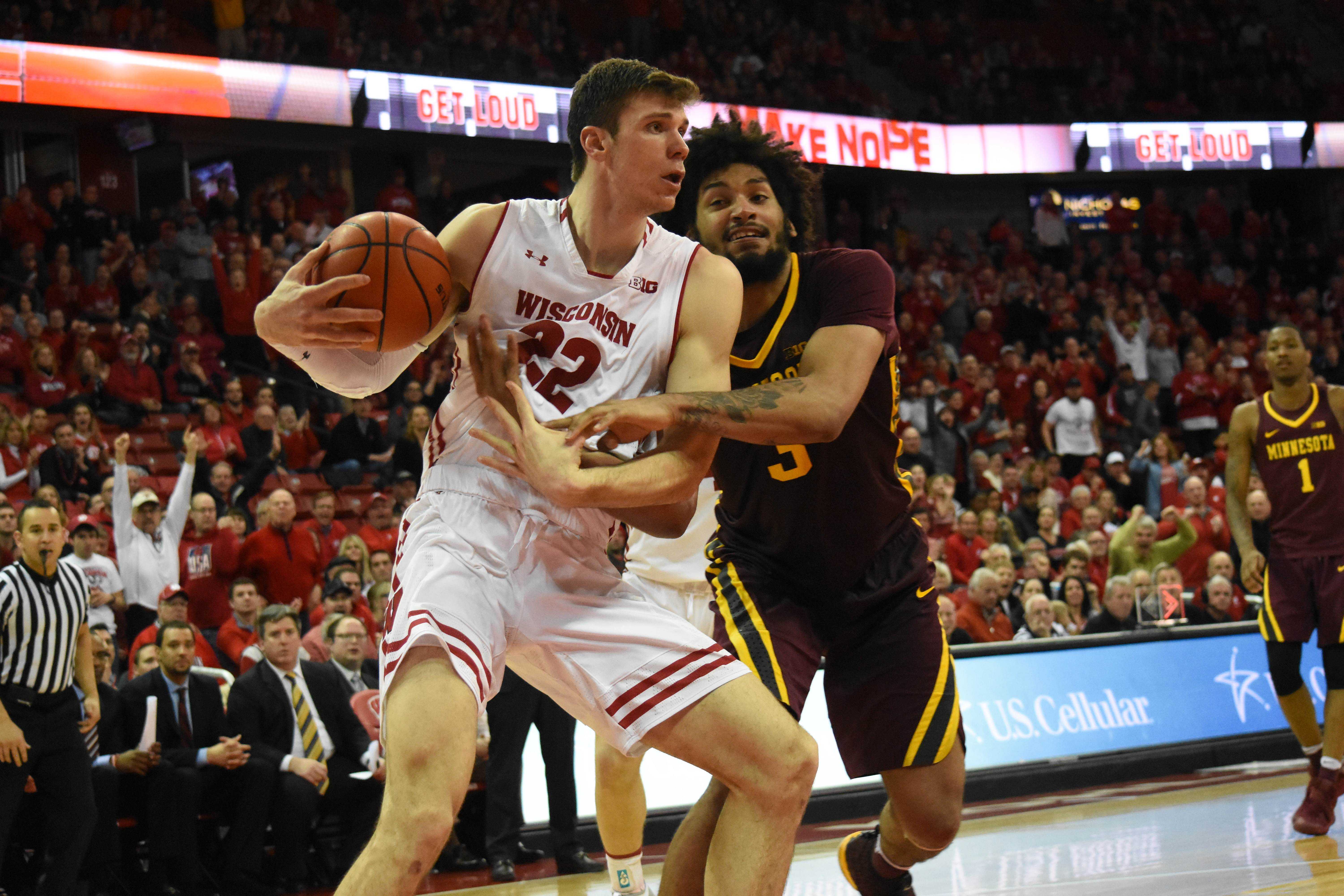 Men’s Basketball Happ’s triple double paves way for 8563 Badger