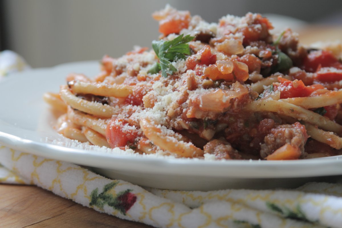 Spaghetti with Sausage, Olives, And Red Bell Pepper Sauce Baker by Nature