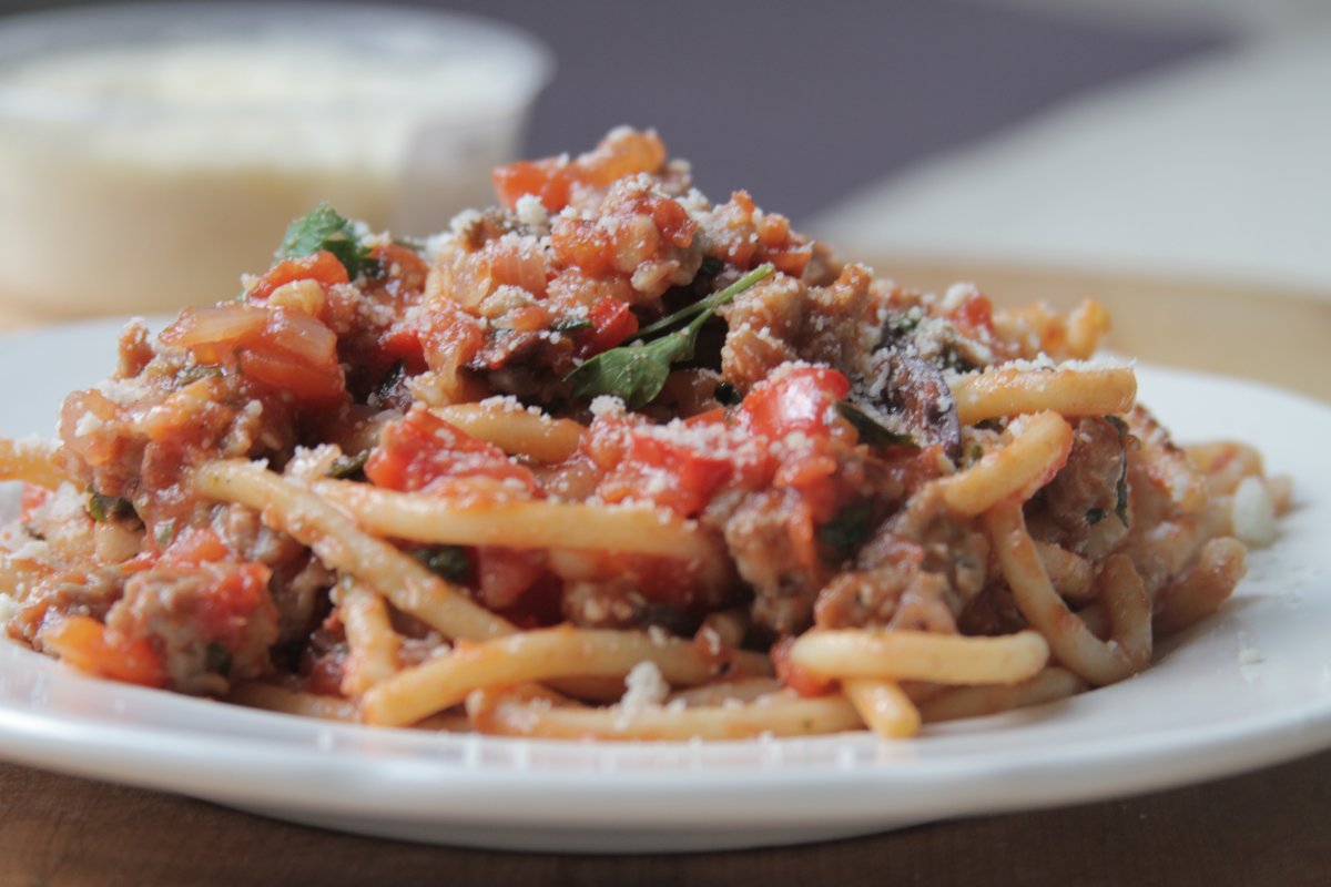 Spaghetti with Sausage, Olives, And Red Bell Pepper Sauce Baker by Nature