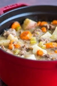 Simple beef stew in a white bowl.