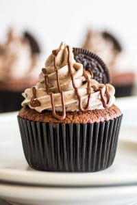 Small-batch Oreo Cupcakes, moist chocolate cupcakes with an Oreo baked right into them, and the best Oreo frosting on top! | #cupcakes | #Oreos | Small-batch Desserts |