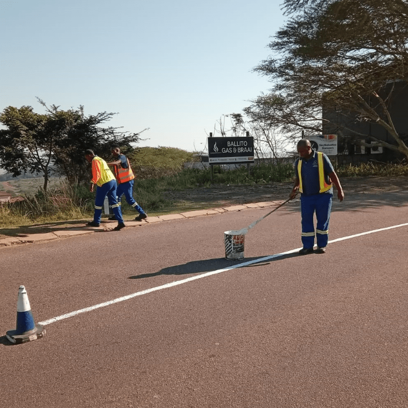 KDM painting traffic lines in the precinct Ballito UIP