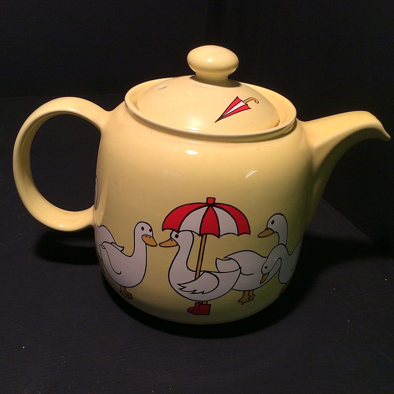 A superb " geese or ducks with umbrellas " hand decorated yellow