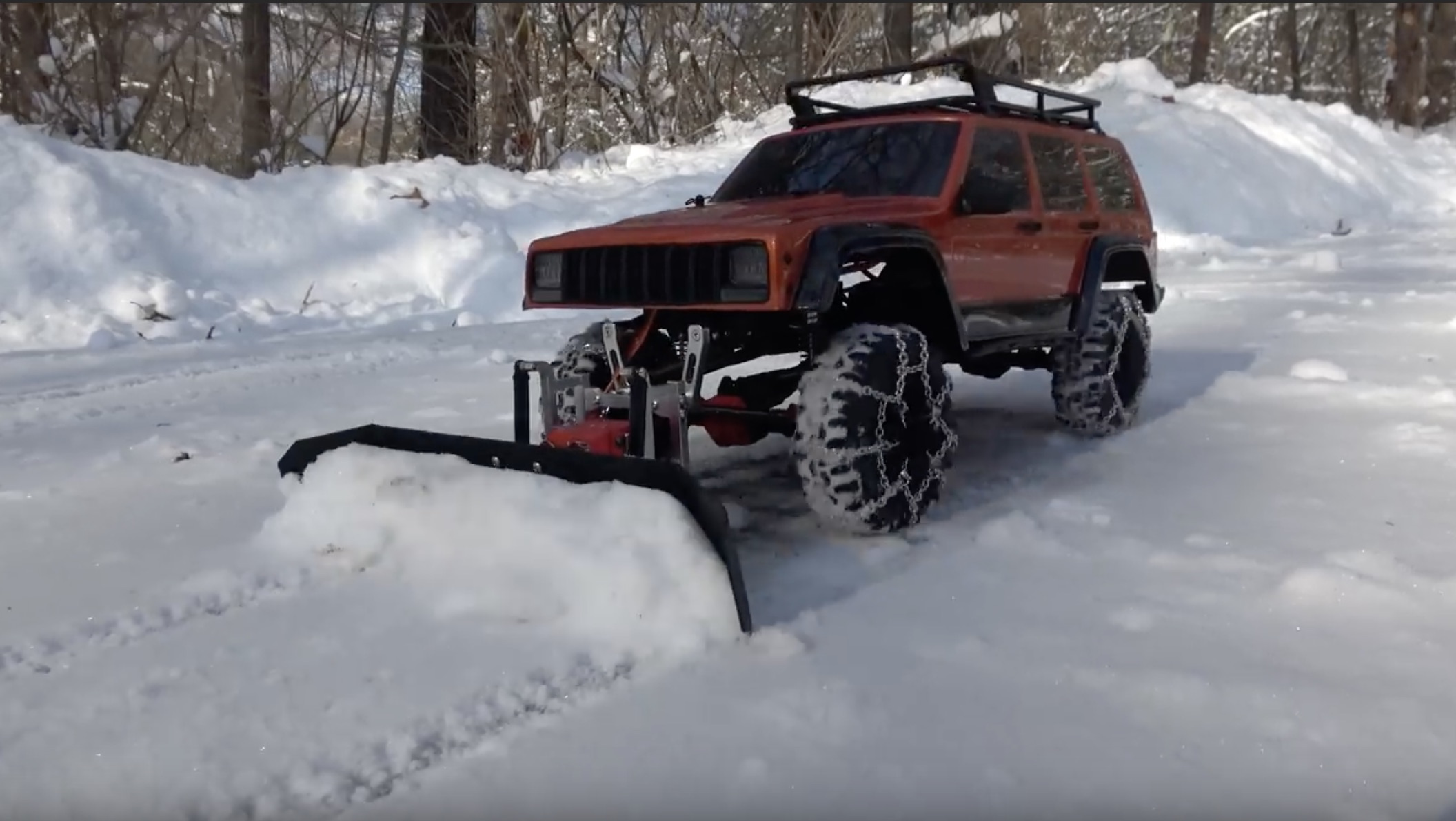 A Thoughtful Gift A RemoteControlled XJ Cherokee Snowplow!
