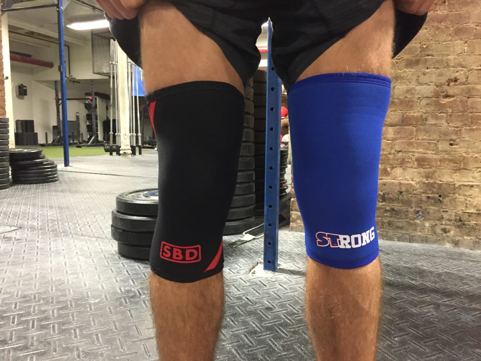 SBD Vs. Slingshot STrong Knee Sleeves — Which Is Best for Squats? BarBend