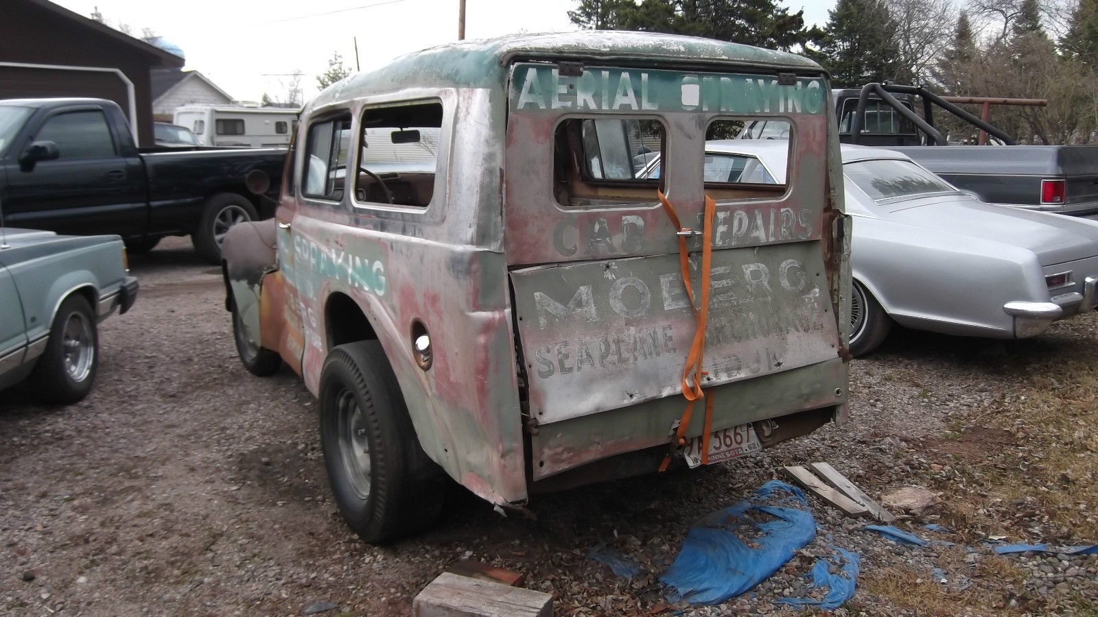 Aerial Spraying! Austin A40 Van
