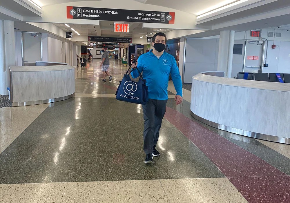 Logan Airport adds PPE vending machines, expands contactless food delivery