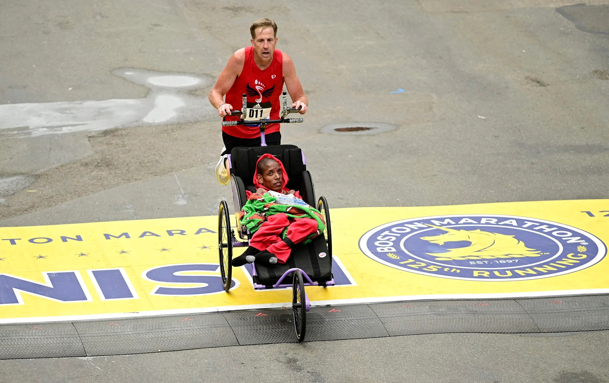 26 photos showing the pure joy and utter exhaustion at the 2021 Boston