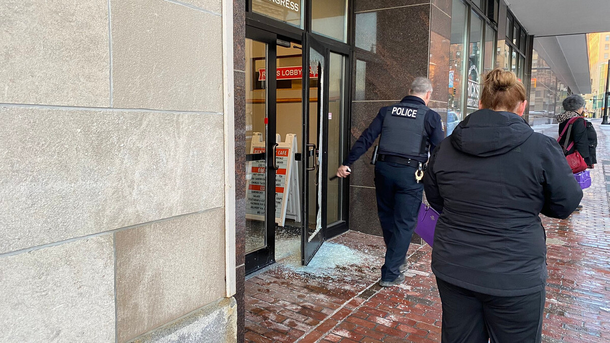 Door shattered at Portland post office