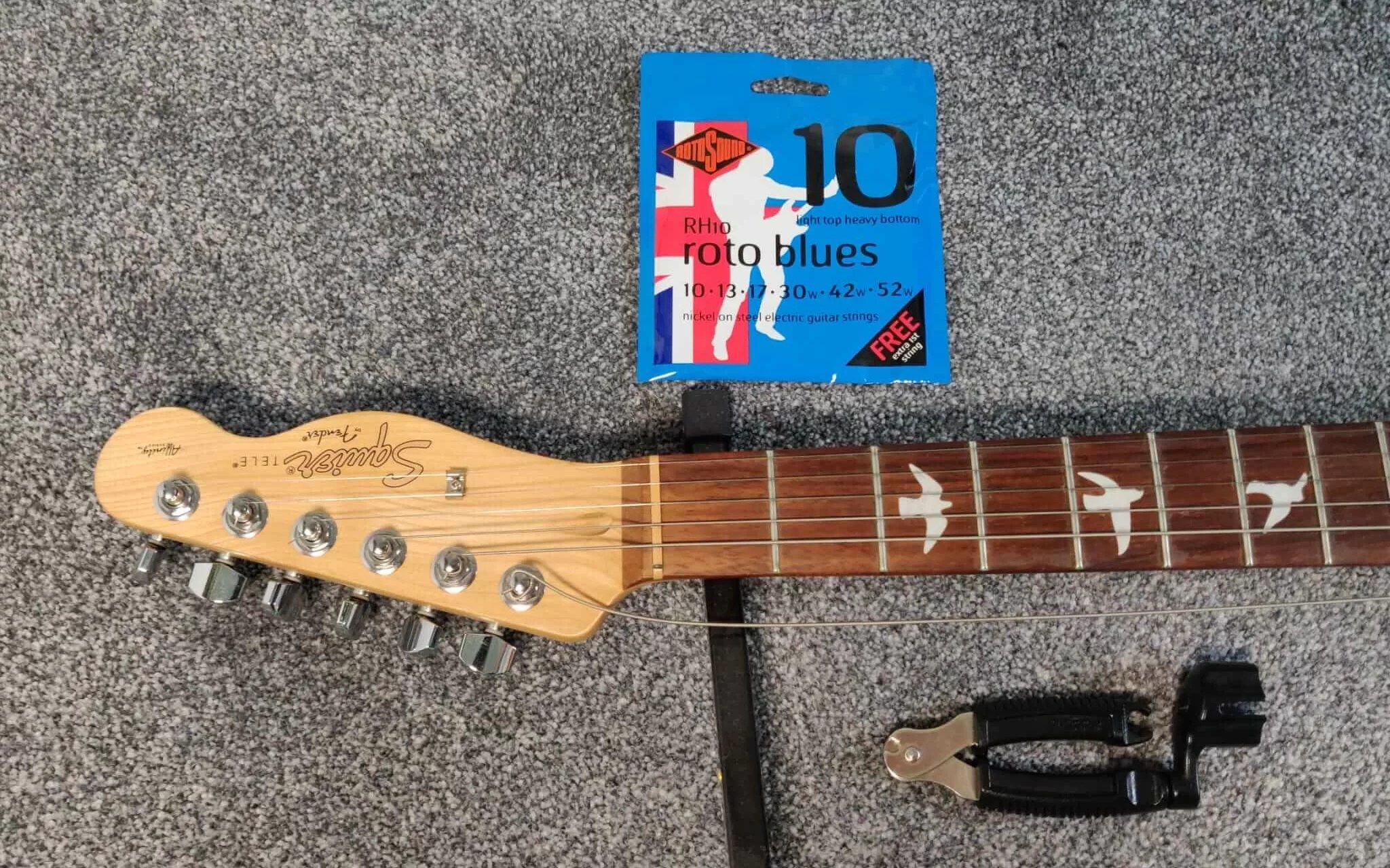 How to Change Electric Guitar Strings - 7 Easy Steps - Beast Mode Guitar