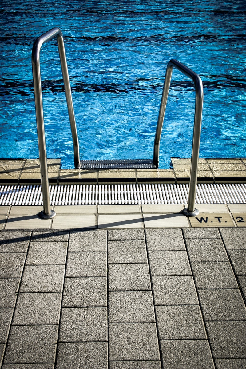 Pavers VS. Concrete Which one is better for your pool decking