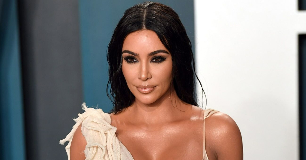 What an extraordinary shot: Half-naked Kim Kardashian, lying on the bed