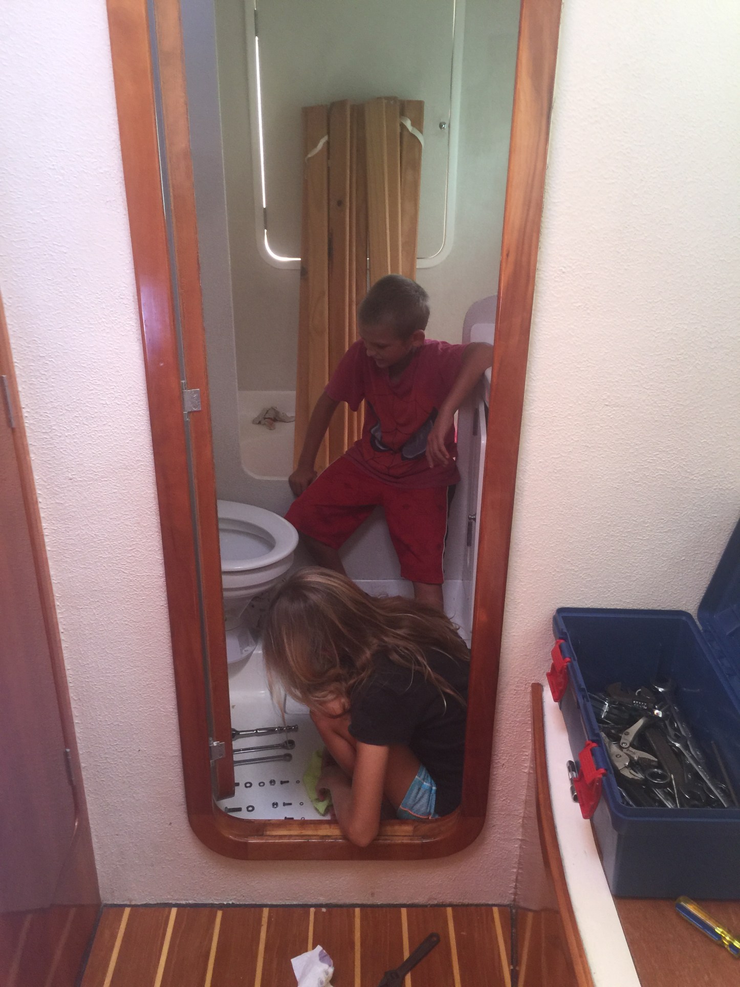 Cruising life what do boat kids learn while fixing marine toilets