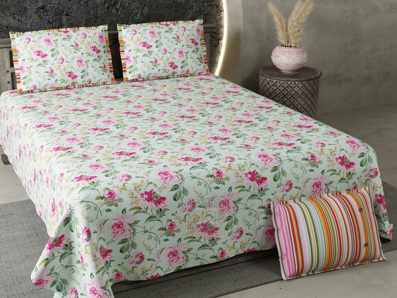 Shades of pastel green and pink allover floral print on double bedsheet