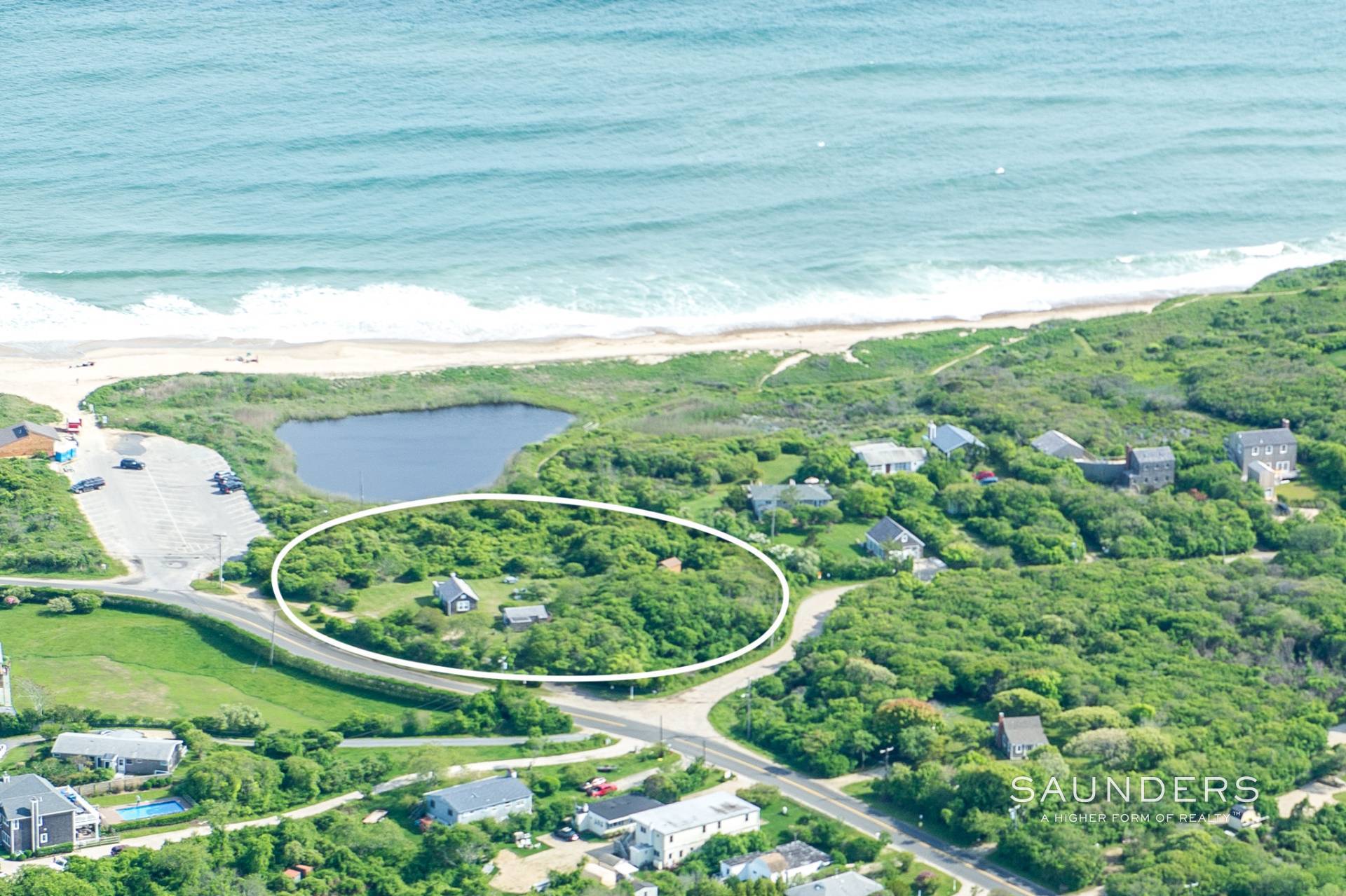 A Building Lot by Ditch Plains Beach Cuts Price 1.5 Million Behind