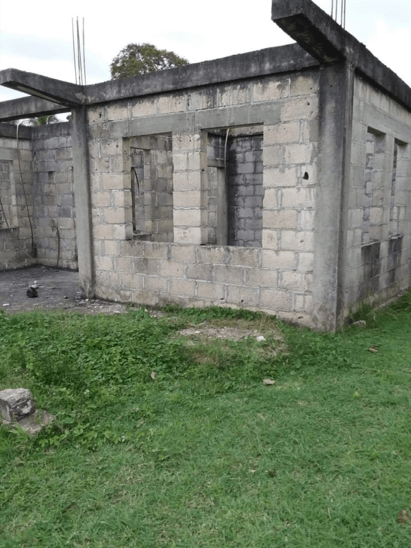 House lot with concrete building and fruit trees for sale in San