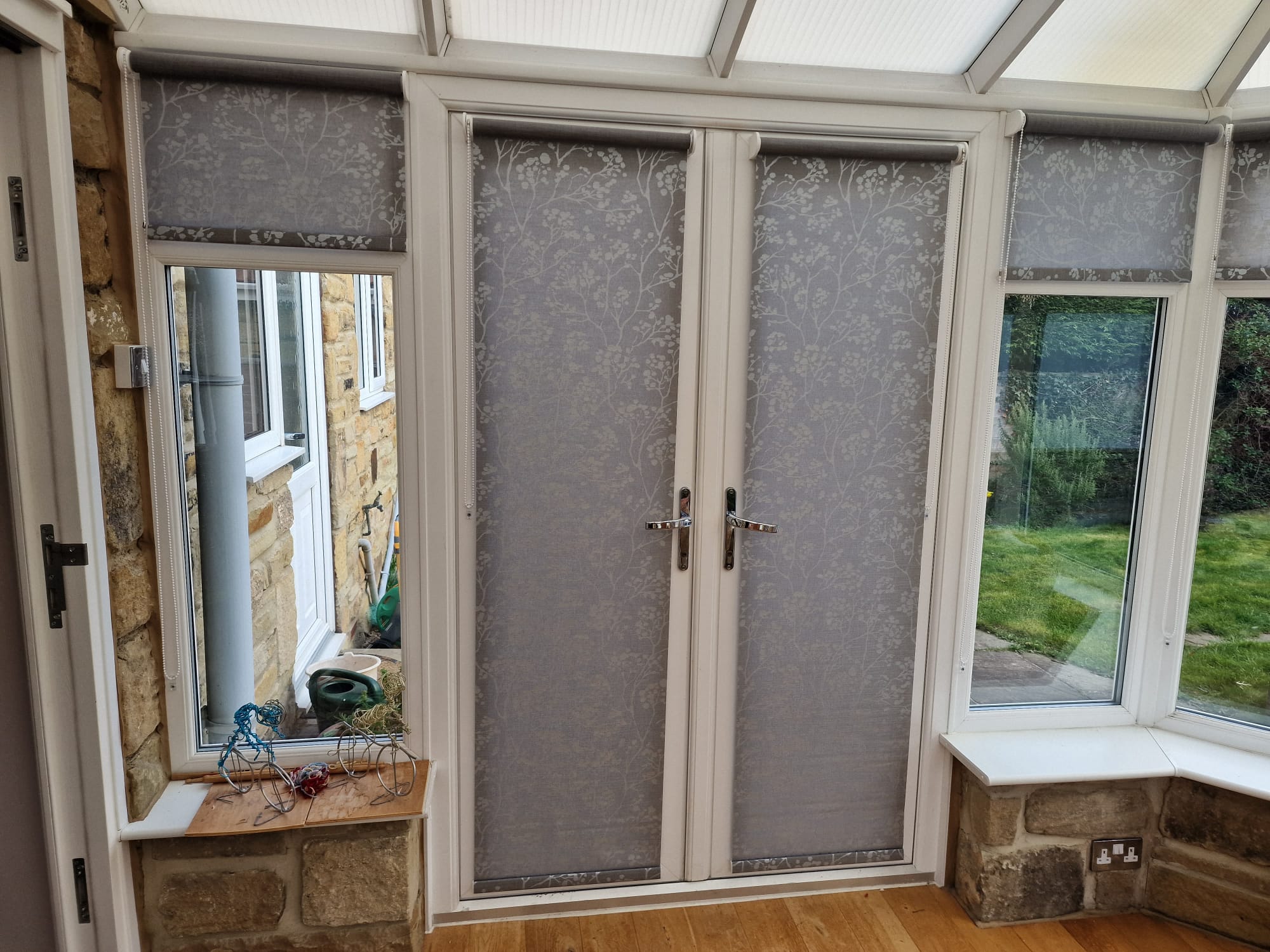 ROLLER BLINDS FOR CONSERVATORY IN GREY AND SILVER PATTERN