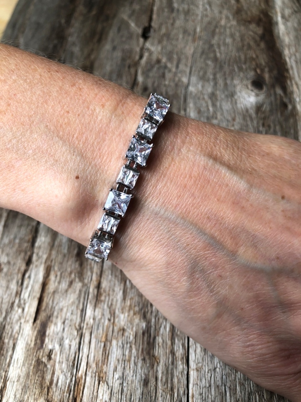 Silver strand Bracelet adjustable sliding clasp with nine Cubic