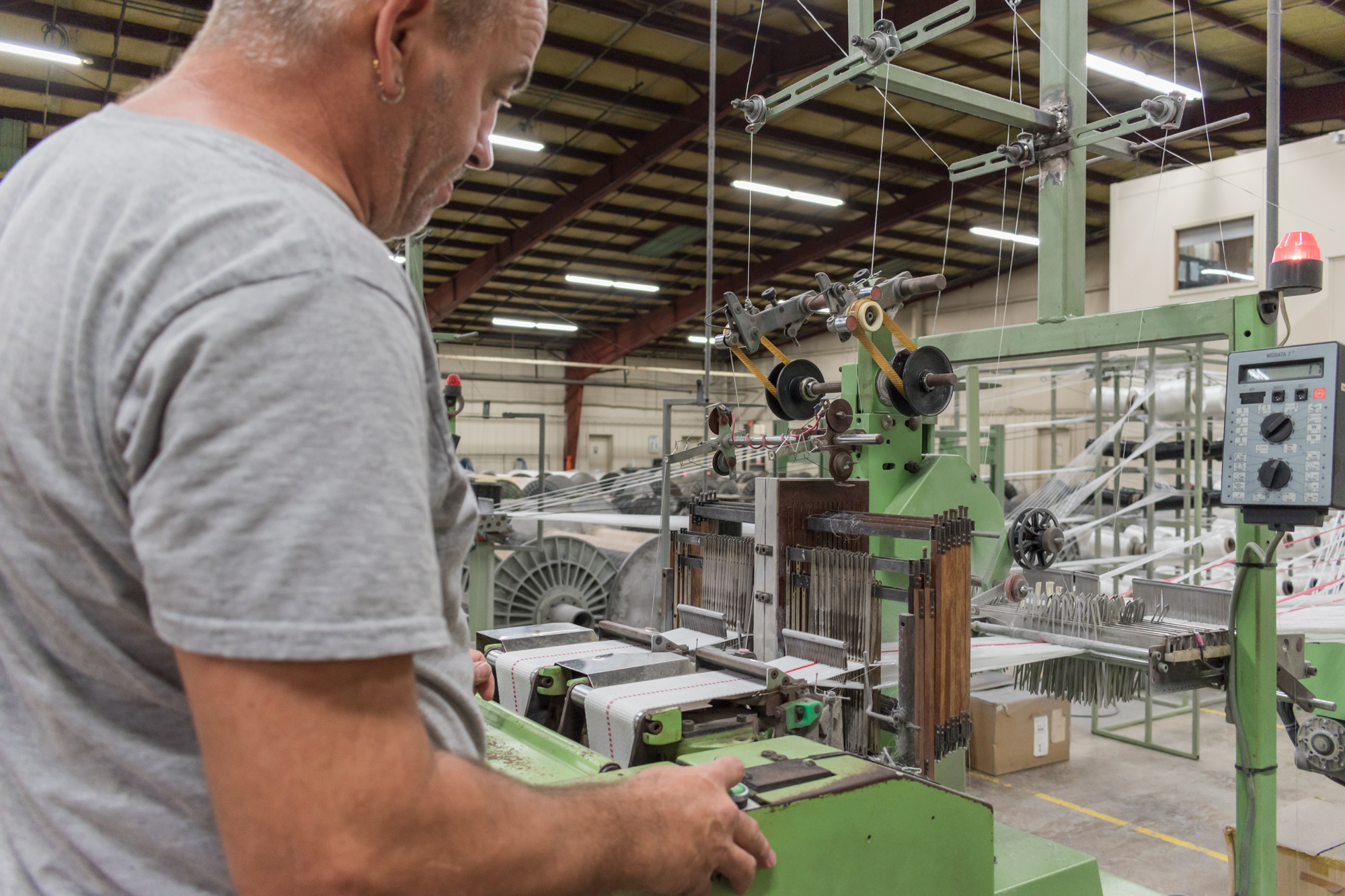 NeedleMachineWorking1 Belton Industries