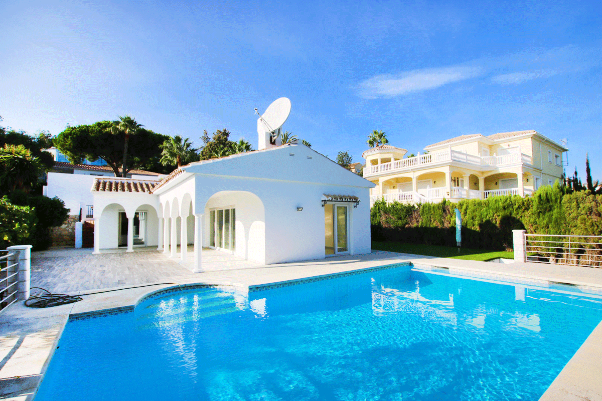 Carib Playa Attractive Andalusian Style BEACHSIDE villa for sale in the popular urbanisation