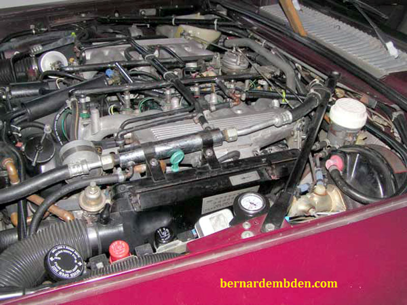 Engine compartment fuel pressure gauge installation project complete.