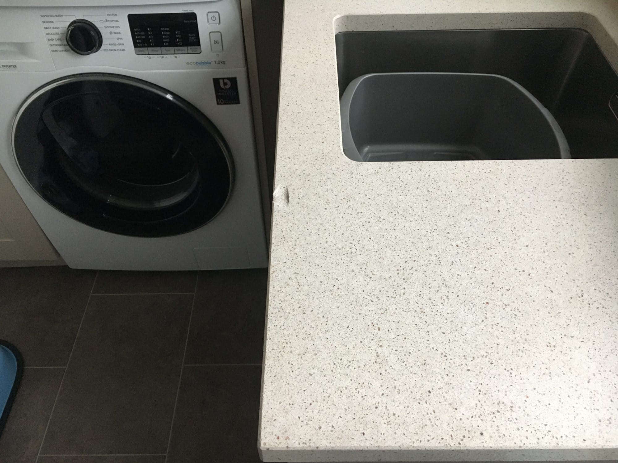 Engineered quartz kitchen worktop edge chip repair Bespoke Repairs