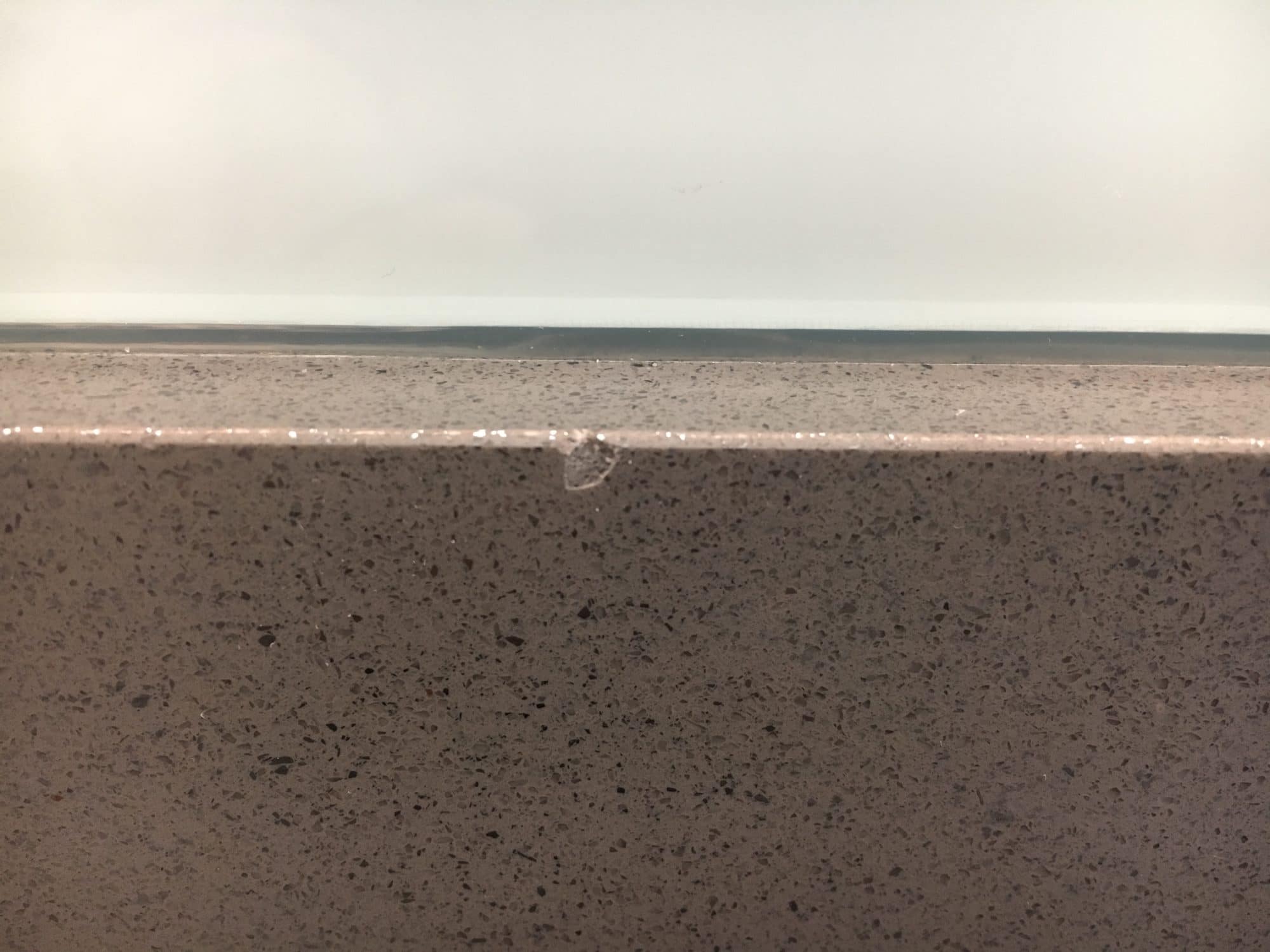 Engineered stone (quartz) chip repairs Bespoke Repairs