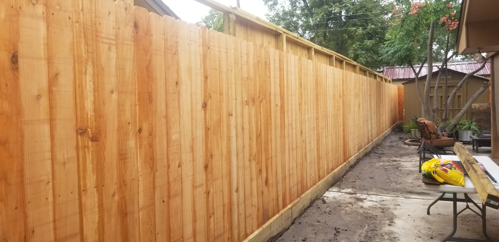 Vertical Fence With Beveled Rot Board Best Fence