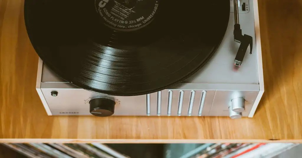 How does a record player know when to stop?